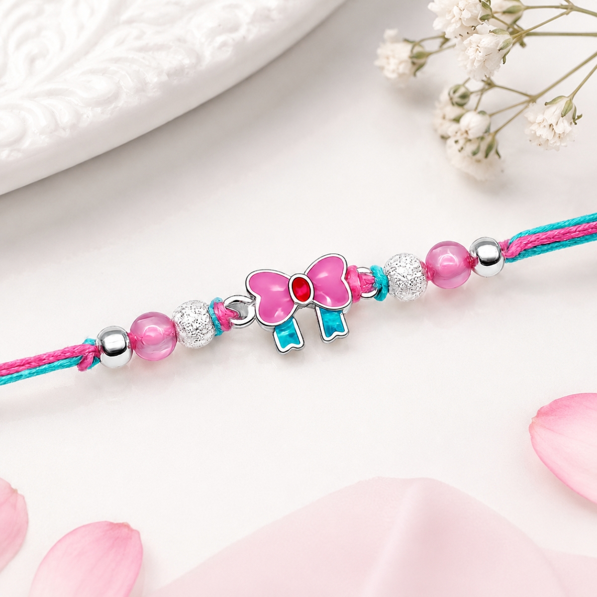 Silver Rakhi Pink Bow Charm Design For Kids